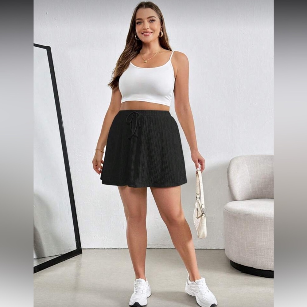 Black pleated skort
